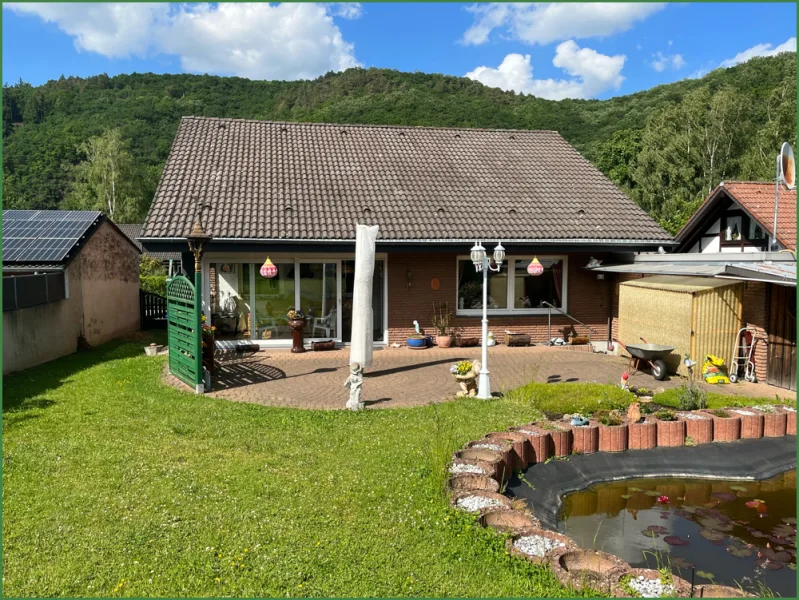 Bungalow Mit Traumhaftem Garten Und Wintergarten In Der Eifel