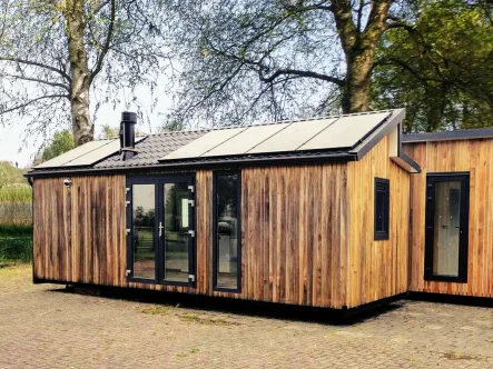 Ferienhaus Holland Kaufen 006 - Haus kaufen in Oostvoorne - Neues Freizeit-Chalet, Tinyhouse, komplett eigenständig (1173)