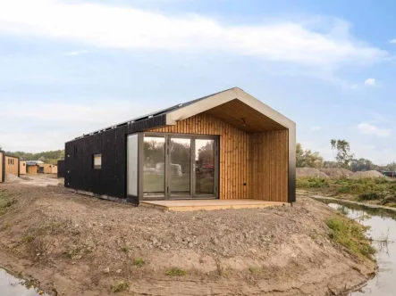 Ferienhaus Holland kaufen 002 - Haus kaufen in Zwartewaal - Ferienhaus zum Verkauf am Wasser. Type Adventure 4P. (2014)