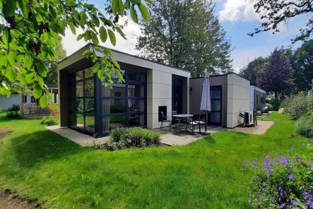 Ferienhaus Holland kaufen 001 - Haus kaufen in Kaatsheuvel - Knapp neuer L-Cube für 4 Personen mit eigenem Grundstück (2181)