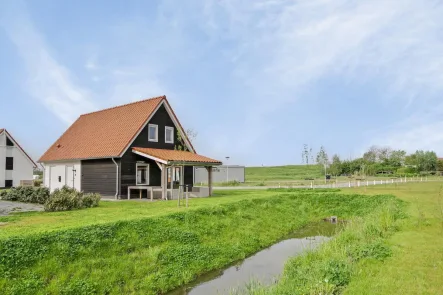 Ferienhaus Holland kaufen 027 - Haus kaufen in Scherpenisse - Schlüsselfertiges Ferienhaus am Wasser (2455)