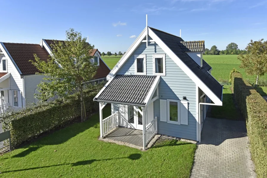 Ferienhaus Holland kaufen 025 - Haus kaufen in Bruinisse - Freizeithaus auf privatem Grund zu verkaufen, mit herrlichem Blick über den Polder (2564)