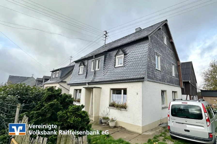 Straßenansicht - Haus kaufen in Laufersweiler - Einfamilienhaus in ruhiger Lage!