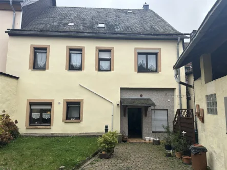 Aussenansicht - Haus kaufen in Baumholder - Einfamilienhaus mit viel Platz und gemütlichem Garten