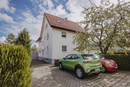 Ansicht - Haus kaufen in Heubach - 3-Familienhaus in beliebter Heubacher Wohngegend!