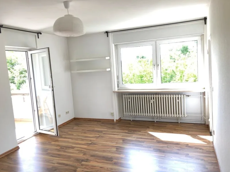 Wohnzimmer_1.3 - Wohnung kaufen in Frankfurt am Main / Schwanheim - ***Kapitalanlage***Hervorragend vermietete Zwei-Zimmer-Wohnung mit Einbauküche und eigenem Stellplatz