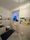 Gäste-WC mit Waschmaschinenanschluss