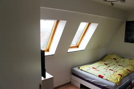 Schlafzimmer - Wohnung kaufen in Zwickau - Schöne Dachgeschosswohnung in Marienthal