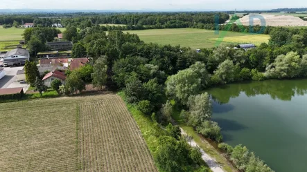 Lage mit Umgebung - Grundstück kaufen in Pocking - Ruhiges und vollerschlossene Baugrundstück mit Altbestand in Seenähe zu verkaufen