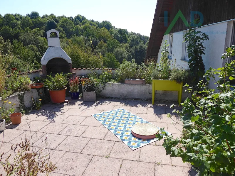 Dachterrasse mit gemauertem Grill