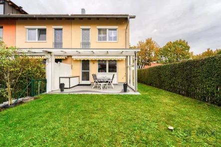 Blick auf die Terrasse - Haus kaufen in Pliening - FAMILIENSTARReiheneckhaus in Pliening/ Landsham!