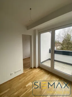 Blick in den Schlafbereich - Wohnung mieten in München / Allach - Erstbezug 1,5 Zimmer Wohnung inkl. Einbauküche und Balkon.