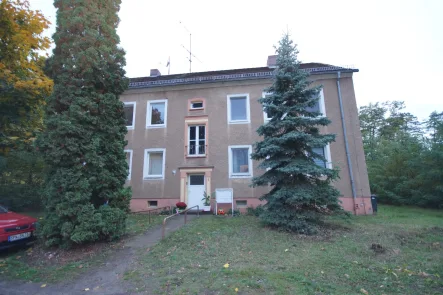 Hausansicht  - Haus kaufen in Graunstein  - Drei Vierfamiliehhäuser in Alleinlage am Waldrand in Graustein zu verkaufen!