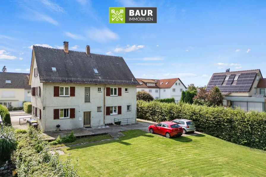 Luftaufnahme - Haus kaufen in Bad Wurzach - 2-Familienhaus in begehrter Lage direkt am Stadtgarten von Bad Wurzach