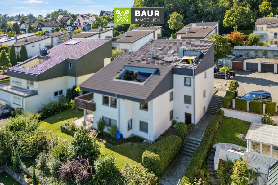 Titelbild - Wohnung kaufen in Berg - Charmante 1,5-Zimmer-Wohnung mit spektakulärem Ausblick in herrlicher Hanglage von Berg.