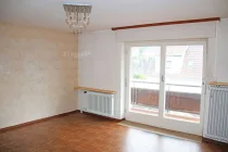 Schlafzimmer mit Zugang zum Balkon