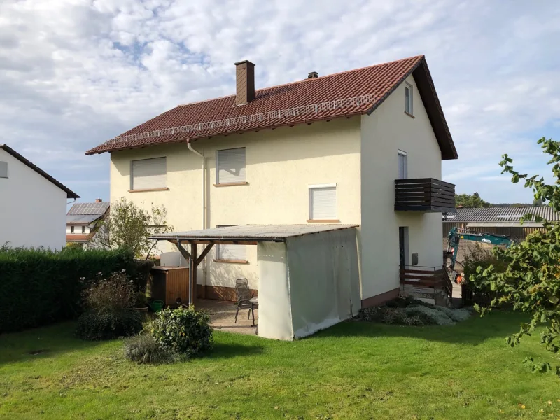 Außenansicht - Haus kaufen in Waldbrunn - Könnte so Ihr neues Zuhause aussehen?2-Familienhaus mit Garage und schönem Gartengrundstück