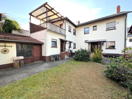 Gartenansicht - Haus kaufen in Neulußheim - Großzügiges 2-Familienhaus in gefragter Lage von Neulußheim