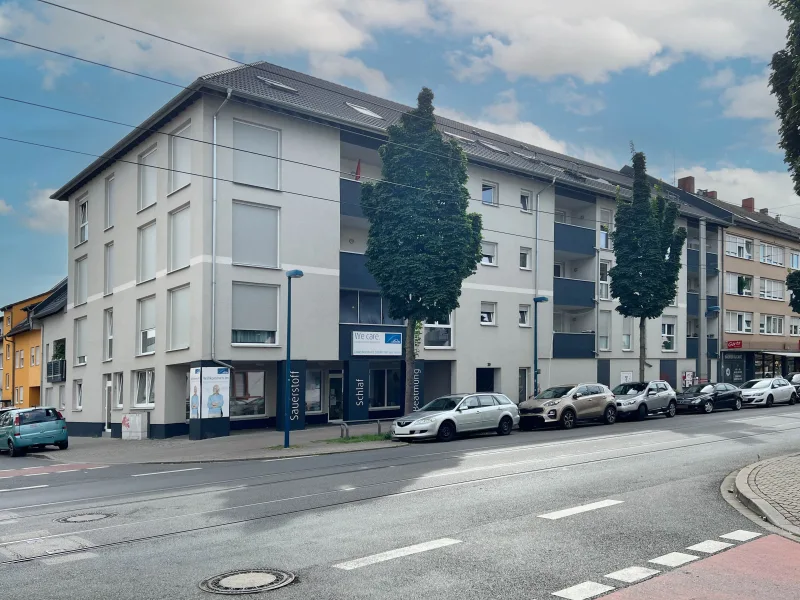 Vorderansicht - Haus kaufen in Mannheim - Investmentobjekt in gefragter Lage von MA-Rheinau mit 22 Wohneinheiten und einer Ladeneinheit 