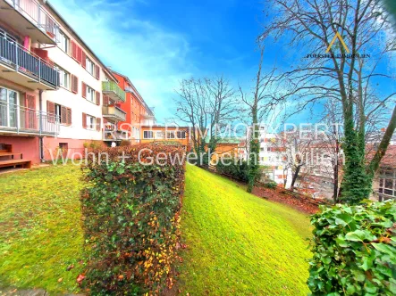 3-ZW mit Balkon - Wohnung kaufen in Pforzheim - Sonnige 3-Zimmerwohnung mit Süd-Balkon und Parkblick im Erdgeschoss/Hochparterre inklusive Keller