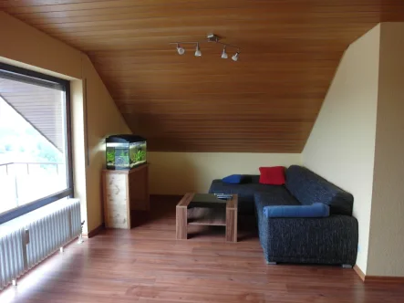 Wohnzimmer - Wohnung mieten in Dornstetten - Großzügige Dachgeschosswohnung mit toller Fernsicht!