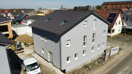 linke DHH - Haus kaufen in Mahlberg - IMA-Immobilien bietet eine Neubau Doppelhaushälfte, schlüsselfertig.