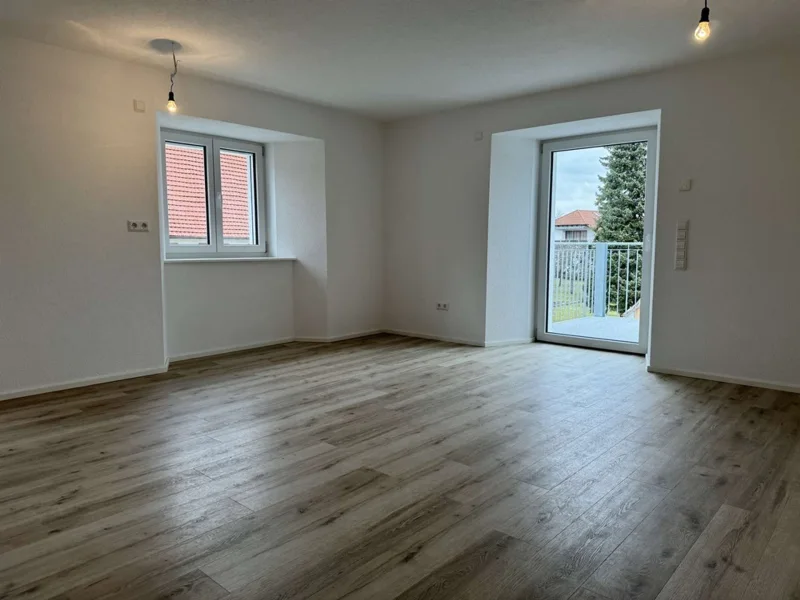   - Wohnung kaufen in Emmingen-Liptingen - 2-Zimmer OG Wohnung im Neubau-Standard mit Küche und Balkon!