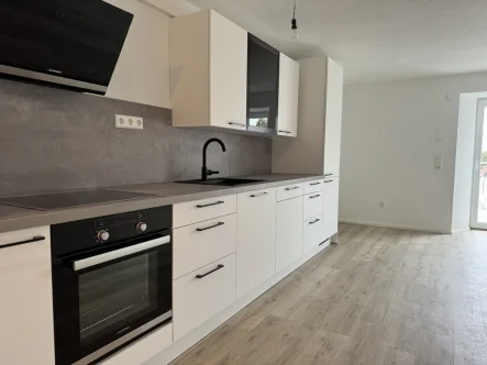   - Wohnung kaufen in Emmingen-Liptingen - 2-Zimmer OG Wohnung im Neubau-Standard mit Küche und Balkon!