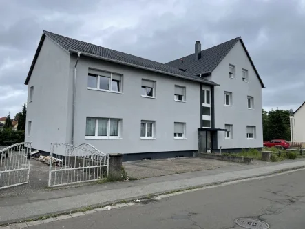  - Zinshaus/Renditeobjekt kaufen in Homburg - 9-Familienhaus in Homburg nach umfangreicher Sanierung- Top Rendite!