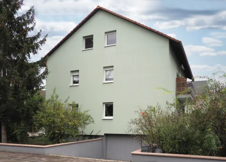 Seitenansicht - Haus kaufen in Dettenheim - Sehr attraktive Kapitalanlage mit Potential - umfassend energetisch saniert