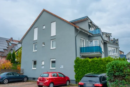 Hausansicht - Wohnung kaufen in Eggenstein-Leopoldshafen - Geräumige 4-Zimmer-Wohnung mit Süd-West-Balkon in ruhiger Lage von Eggenstein