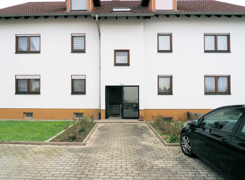 Hausnasicht - Wohnung kaufen in Philippsburg - Ansprechende 3-Zimmer-Wohnung mit TL-Bad, großer Terrasse und Stellplatz