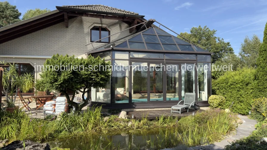 Ansicht mit Wintergarten - Haus kaufen in Helsa / Eschenstruth - Traumhaus mit XXL-Gartenparadies und DG-Ausbaupotenzial !