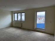 Wohn- und Esszimmer mit Balkon