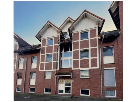 Vorderansicht - Wohnung kaufen in Ronnenberg - Moderne Wohnung mit Garten, Terrasse und herrlichem Ausblick