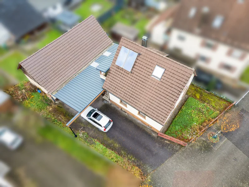 Oben - Haus kaufen in Gaggenau - Sanierungsobjekt mit Charme: Freistehendes Haus mit großer Nutzfläche (Carport, Garage und Scheune)