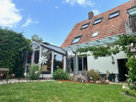 Immobilien verkaufen Karlsruhe - Haus kaufen in Karlsruhe / Thomashof - Gemütliches Eigenheim mit herrlichem Garten