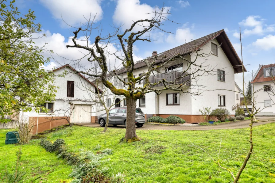Rückansicht - Haus kaufen in Pfinztal-Söllingen - Vielseitiges Zweifamilienwohnhaus auf großem Grundstück