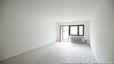 Wohnzimmer - Wohnung kaufen in Badenweiler - In wundervoller Lage von Badenweiler mit Ausbaupotenzial, Balkon, Kellerraum & Garagenstellplatz