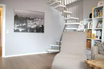 Wohnbereich mit Treppe zum DG
