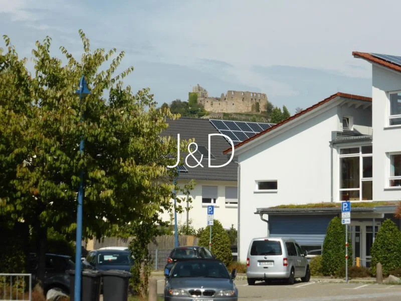 Anwohnerstr. mit Blick zur Burg - Wohnung kaufen in Staufen im Breisgau - schöne, vermietete 4-Zimmer-EG-Maisonette-Wohnung in Staufen