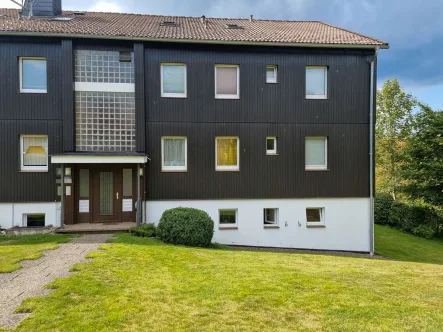 Die Wohnung rechts unten - Wohnung kaufen in Clausthal-Zellerfeld / Buntenbock - Teil-Modernisierte Eigentumswohnung mit Terrasse u. Gartennutzung!