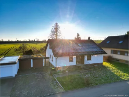  - Haus kaufen in Bad Dürrheim / Sunthausen - Einfamilienhaus in Ortsrandlage mit zwei Garagen und potentieller ELW