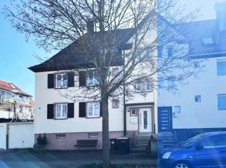 ID1028 - Haus kaufen in Trossingen - Doppelhaushälfte mit zwei Wohnungen und Garage