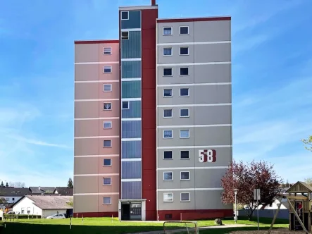 ID1033 - Wohnung kaufen in Aldingen - Modernisierte Drei-Zimmer-Wohnung mit Balkon und Garage
