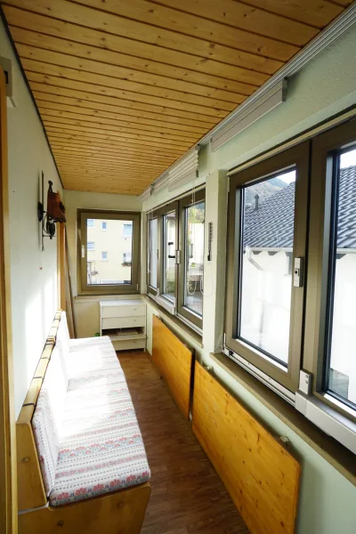 Veranda im Dachgeschoss mit Zugang zur Dachterrasse