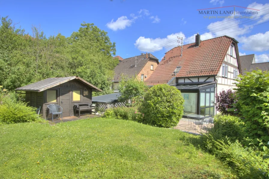Garten - Haus kaufen in Heilbronn / Frankenbach - HÜBSCHES EINFAMILIENHAUS MIT WINTERGARTEN UND TRAUMHAFTEM GARTEN