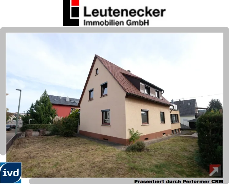 Ansicht - Haus kaufen in Remseck - Charmantes 2-Familienhaus mit Garten in gewachsener Wohnlage