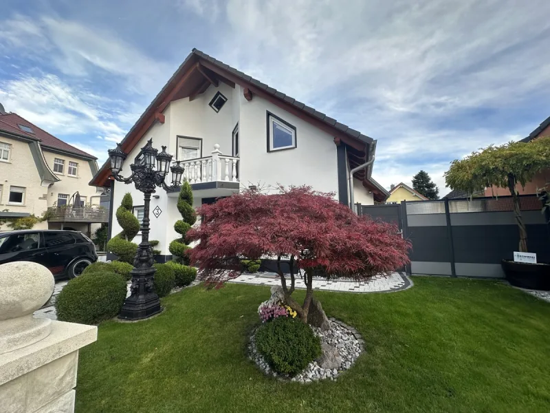 Vorderseite  - Haus kaufen in Stockach - Sie lieben das Besondere in Bodenseenähe,Top gepflegtes Einfamilienhaus in Stockach