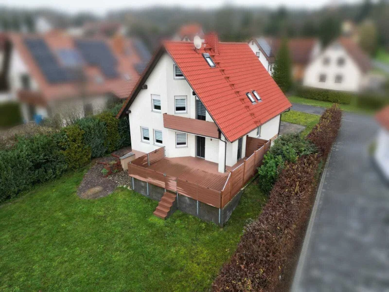 Luftbild Südwestansicht unkenntlich - Haus kaufen in Bad Colberg-Heldburg - Charmant, jung & großzügig - EFH sofort bezugsfähig! 